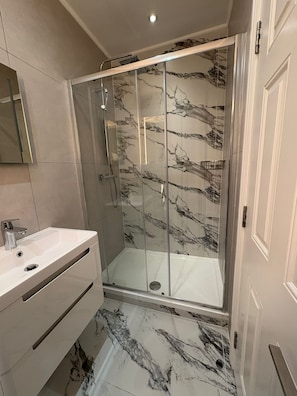 Hair dryer, towels, soap, shampoo