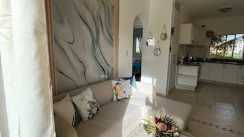 Apartment, Balcony, Pool View | Living area