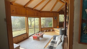 Family House, Patio, Garden View | Living area - Oceana Suites Santa Inés (Coyhaique)