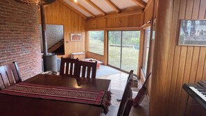 Family House, Patio, Garden View | Dining room - Oceana Suites Santa Inés (Coyhaique)