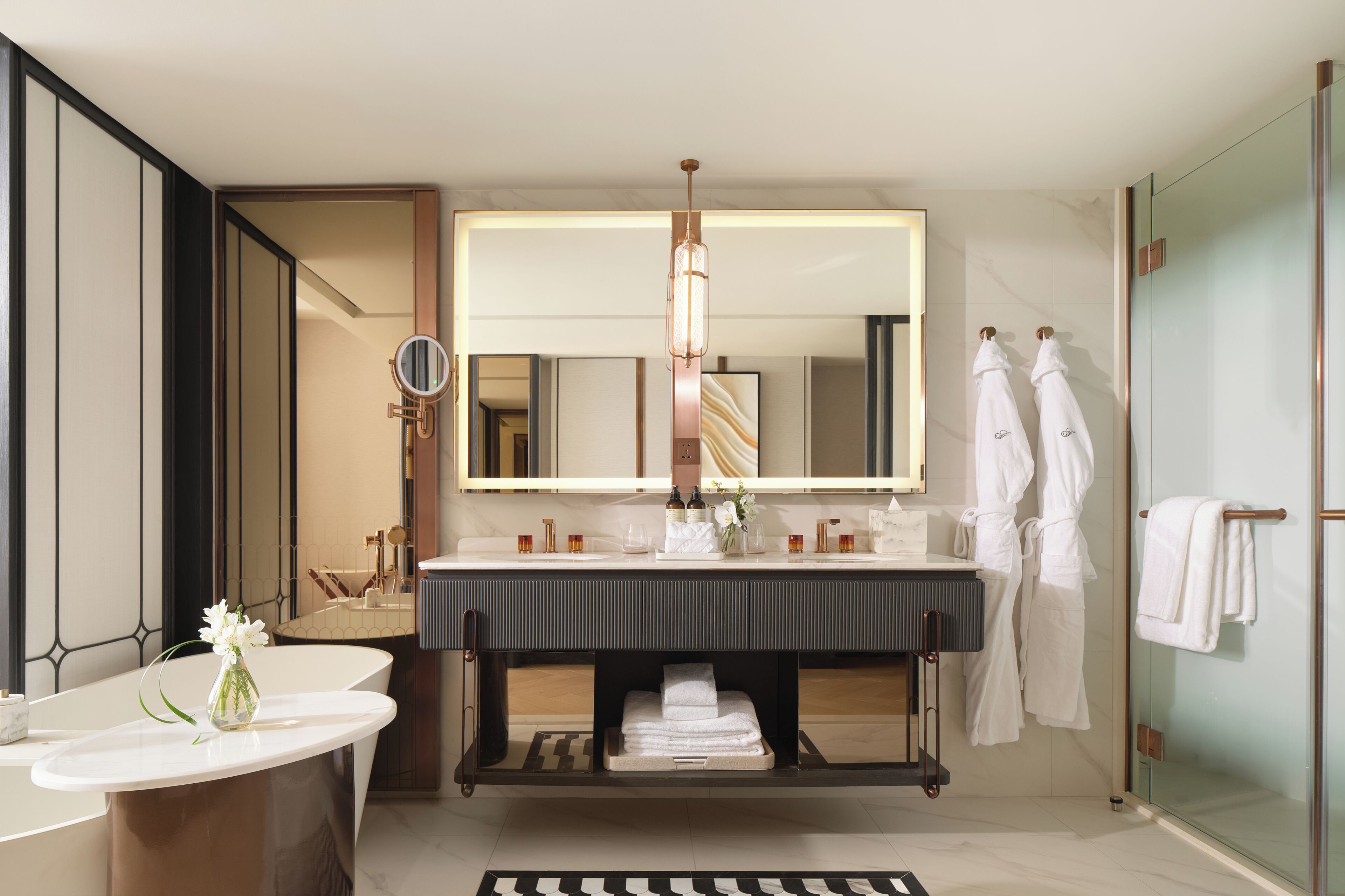 Separate bathtub and shower, rainfall showerhead, free toiletries