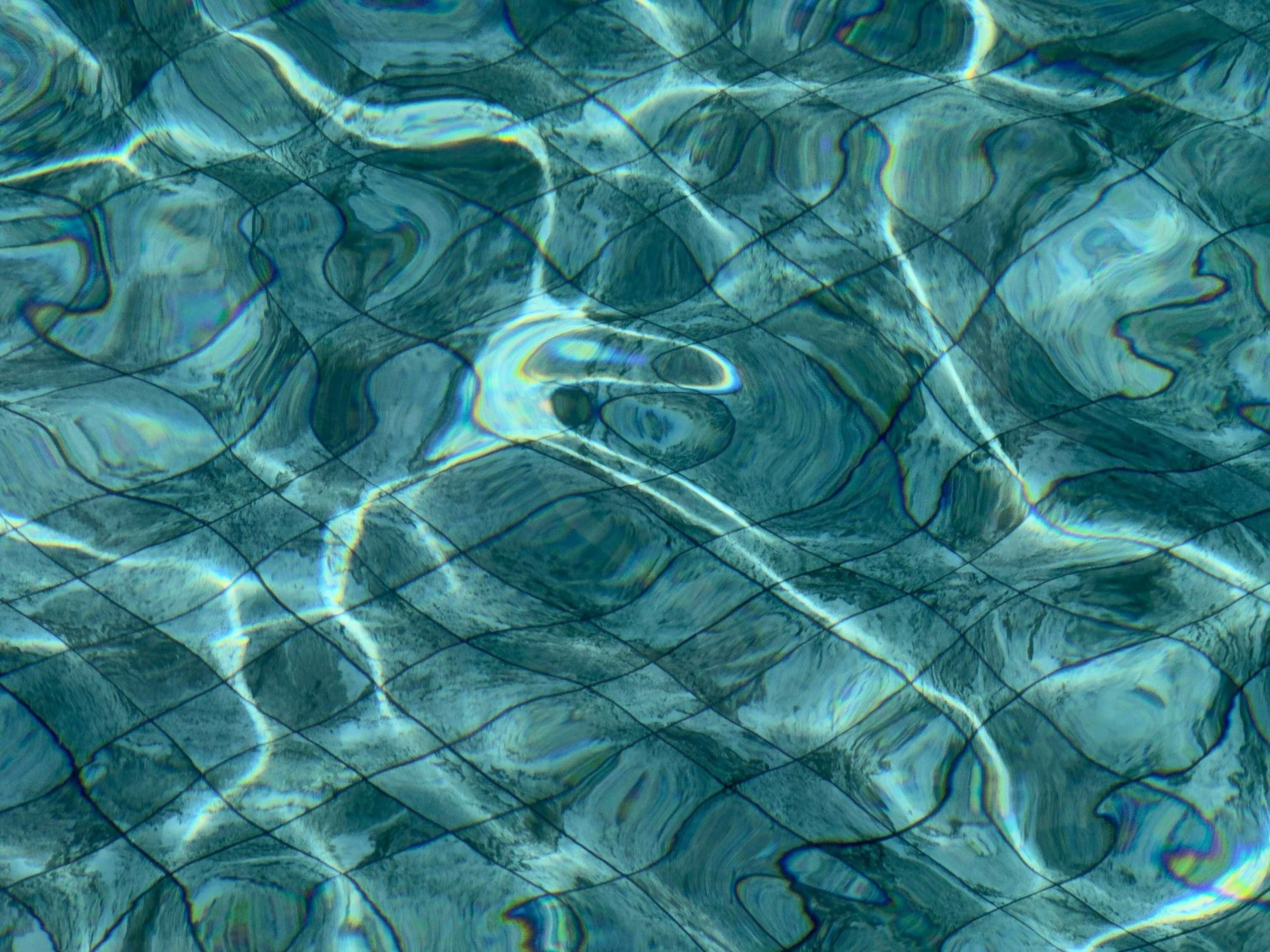 A geometric pattern with intersecting lines and curves.