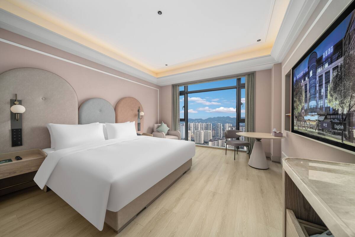 Kamar Deluks, 1 Tempat Tidur King | Minibar gratis, tirai kedap cahaya, dan kedap suara