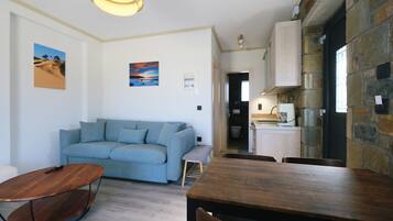 Apartment, 1 Bedroom, Patio, Beach View | In-room safe, soundproofing, iron/ironing board, free WiFi