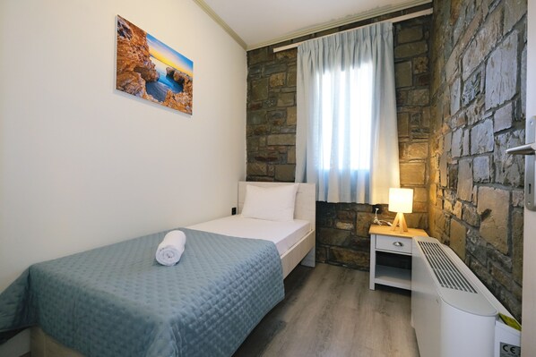 Apartment, 2 Bedrooms, Patio, Beach View | In-room safe, soundproofing, iron/ironing board, free WiFi - Amari stone apartments (Moudros)