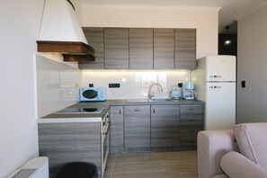 Apartment, 2 Bedrooms, Balcony, Beach View | Private kitchen - Amari stone apartments (Lemnos)