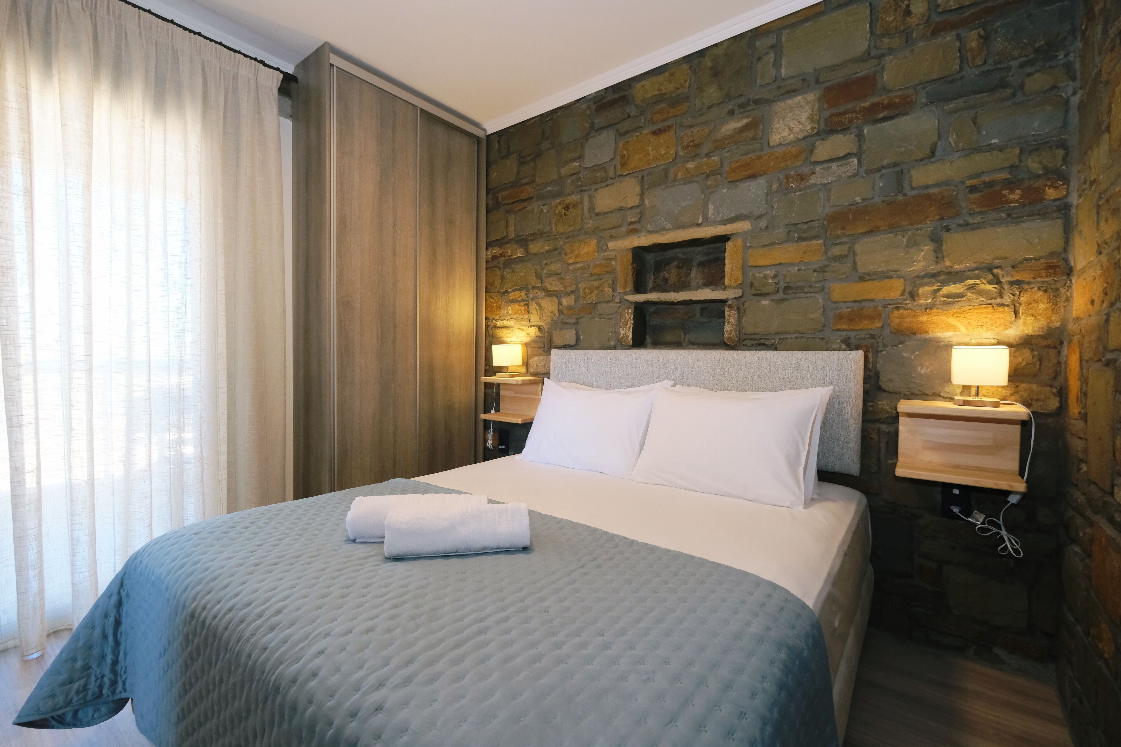 Apartment, 2 Bedrooms, Balcony, Beach View | In-room safe, soundproofing, iron/ironing board, free WiFi