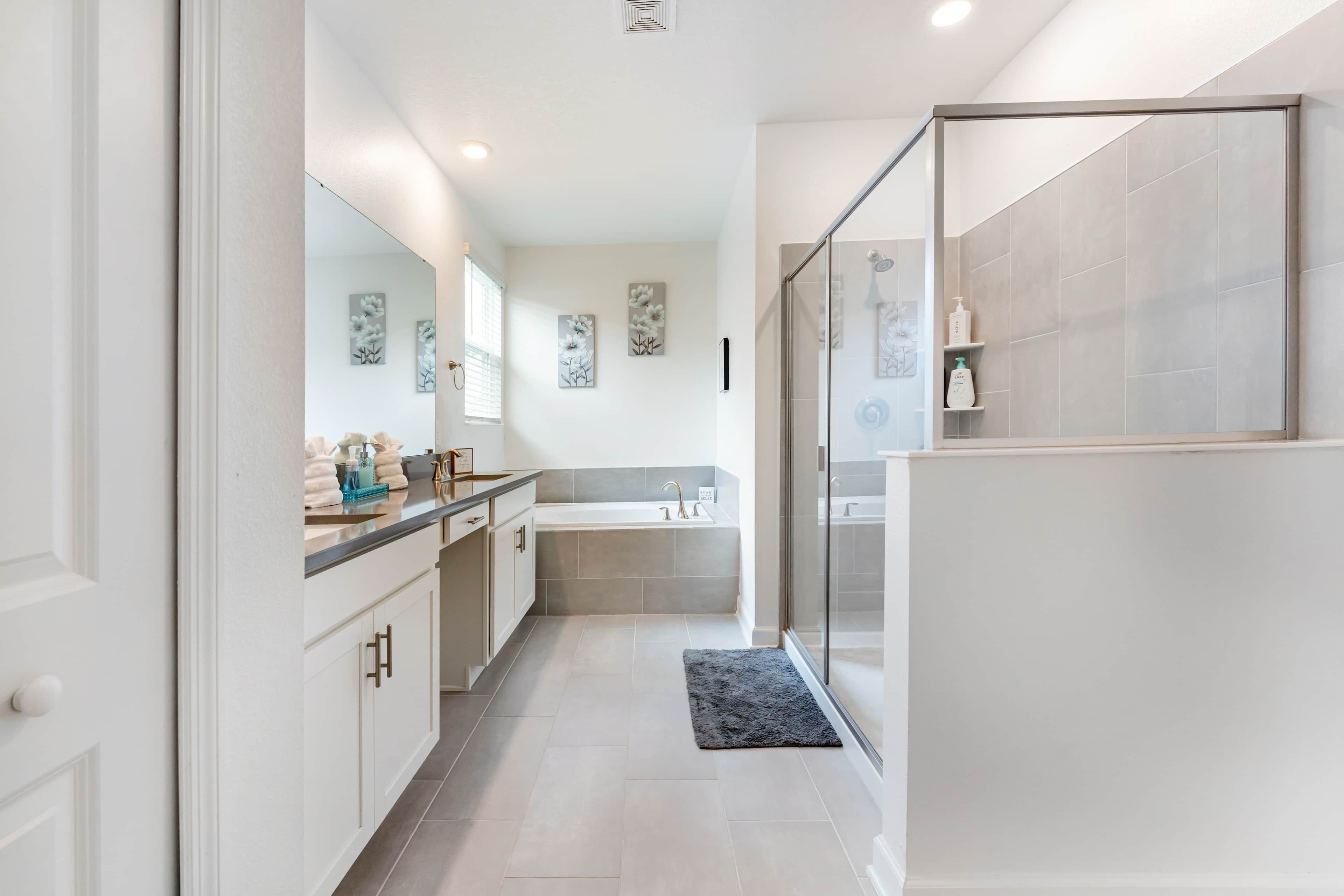 Shower, jetted bath, hair dryer, towels