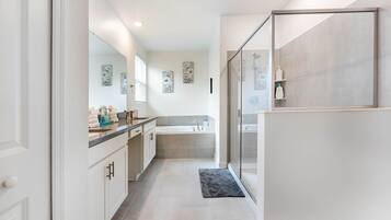 Shower, jetted bath, hair dryer, towels