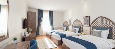 Standard Triple Room | Iron/ironing board, free WiFi