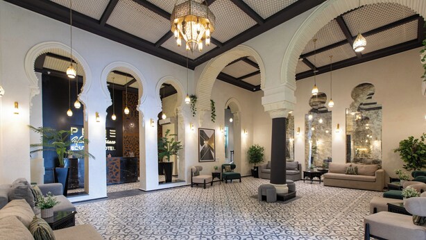 A spacious lobby with high ceilings, arches, and patterned flooring. - Prime Boutique Hotel Heliopolis Terrace (Cairo)