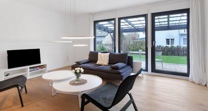 Apartment 'Mergl's' mit privater Terrasse, Gemeinschaftsgarten und WLAN