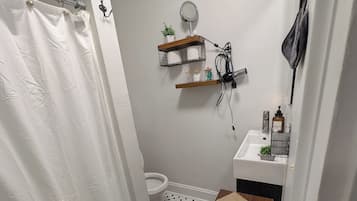 Hair dryer, towels, soap, shampoo