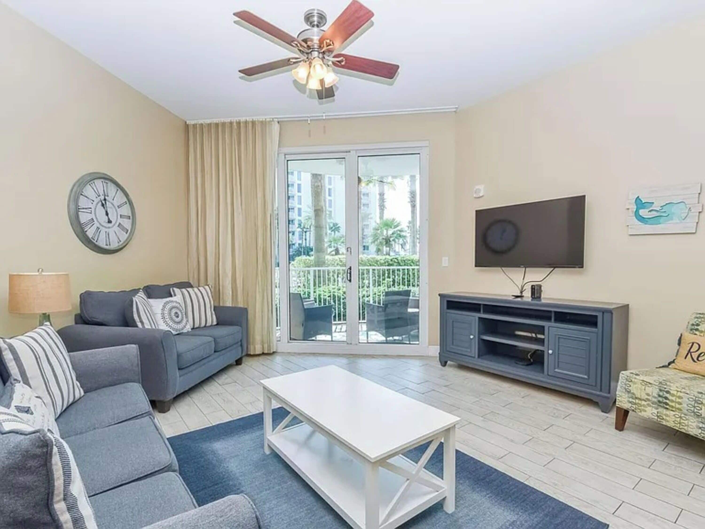 Signature Condo, 2 Bedrooms, Balcony, Pool View | Living room | 40-inch Smart TV with cable channels