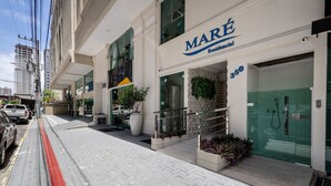 A modern building with a 'MARÉ Residential' sign, a gated entrance, and a visible number '350'. - Apt w/ BBQ & Balcony, 450m From the Beach Sit1202 (Itapema)
