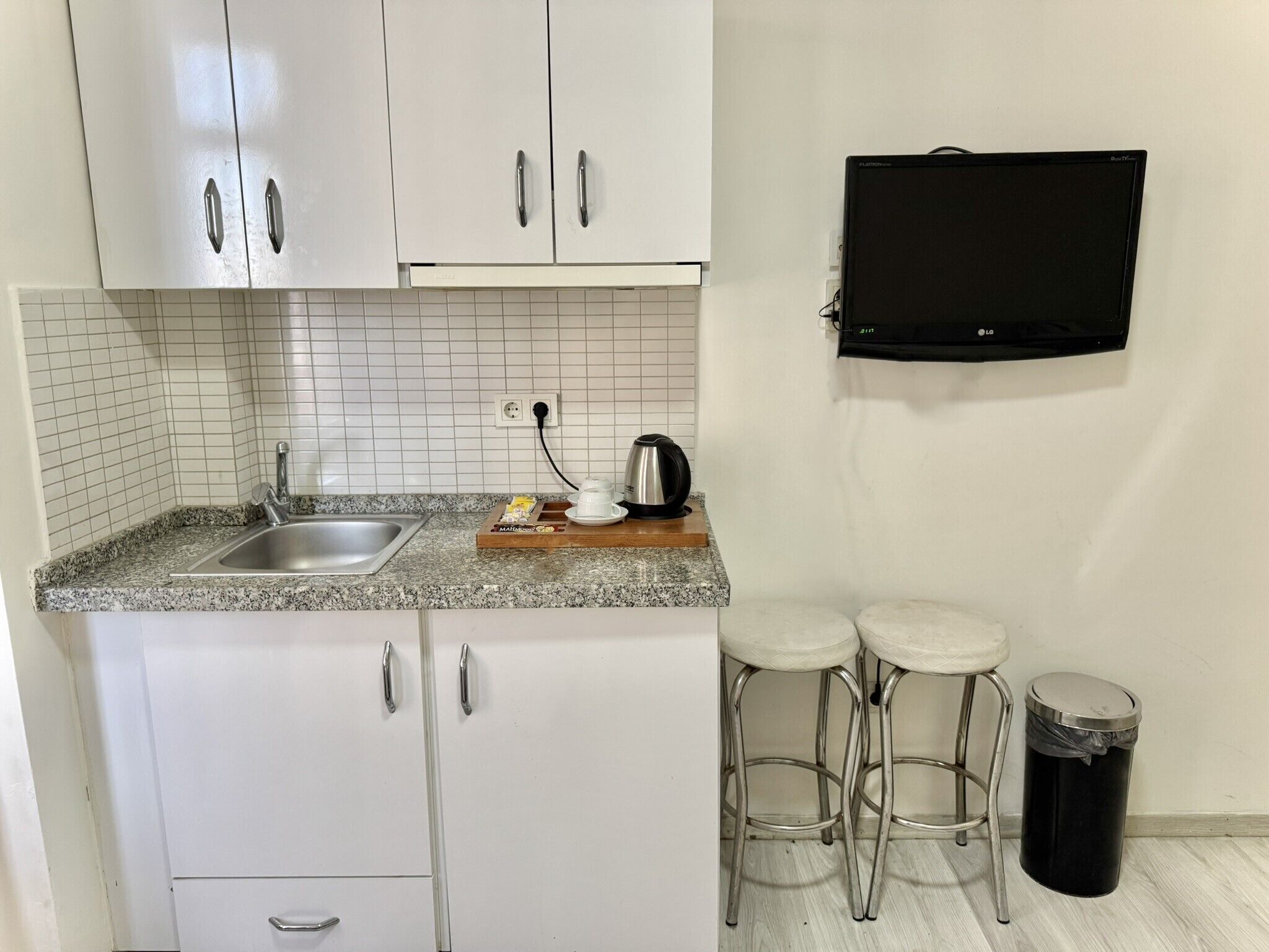 Triple Room, City View | Private kitchen | Mini-fridge