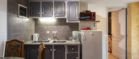 Fridge, electric kettle, highchair