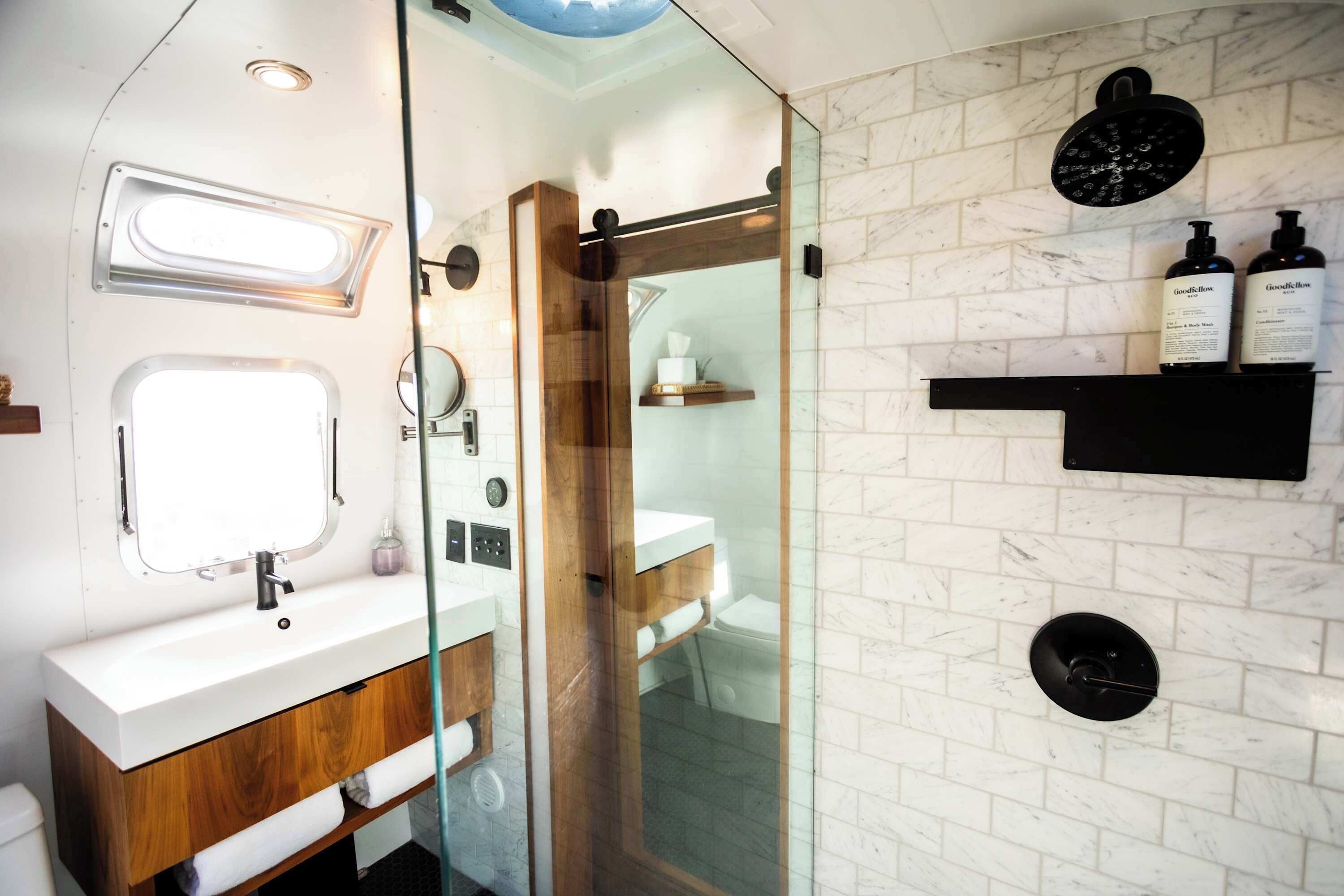 Shower, hair dryer, towels, shampoo