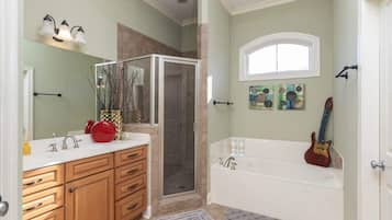 Shower, hair dryer, towels, shampoo