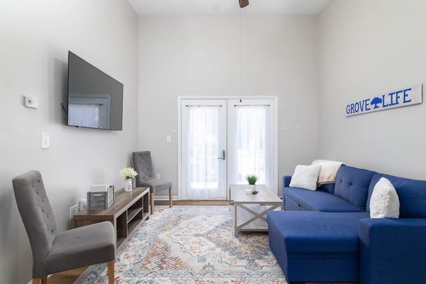 Living Area - Convertible sectional (pulls out into small bed) and we can leave extra bedding (one pillow, a flat sheet, and a blanket) in the chaise storage compartment.