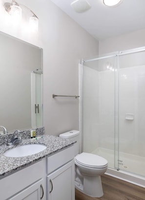 Shower, hair dryer, towels, shampoo