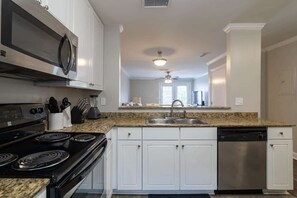 Fridge, microwave, oven, stovetop - Lovely Upstairs 2-Bedroom condo with a pool (Oxford)