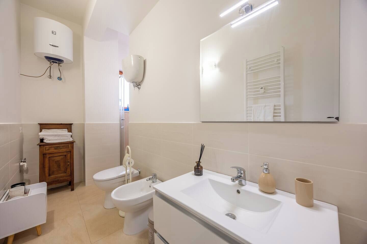 Shower, bidet, towels, soap