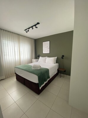 2 bedrooms, WiFi, bed sheets - Cozy apartment in Canasvieiras (Florianópolis)