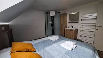 Blackout drapes, iron/ironing board, free WiFi