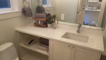 Hair dryer, towels, soap, toilet paper