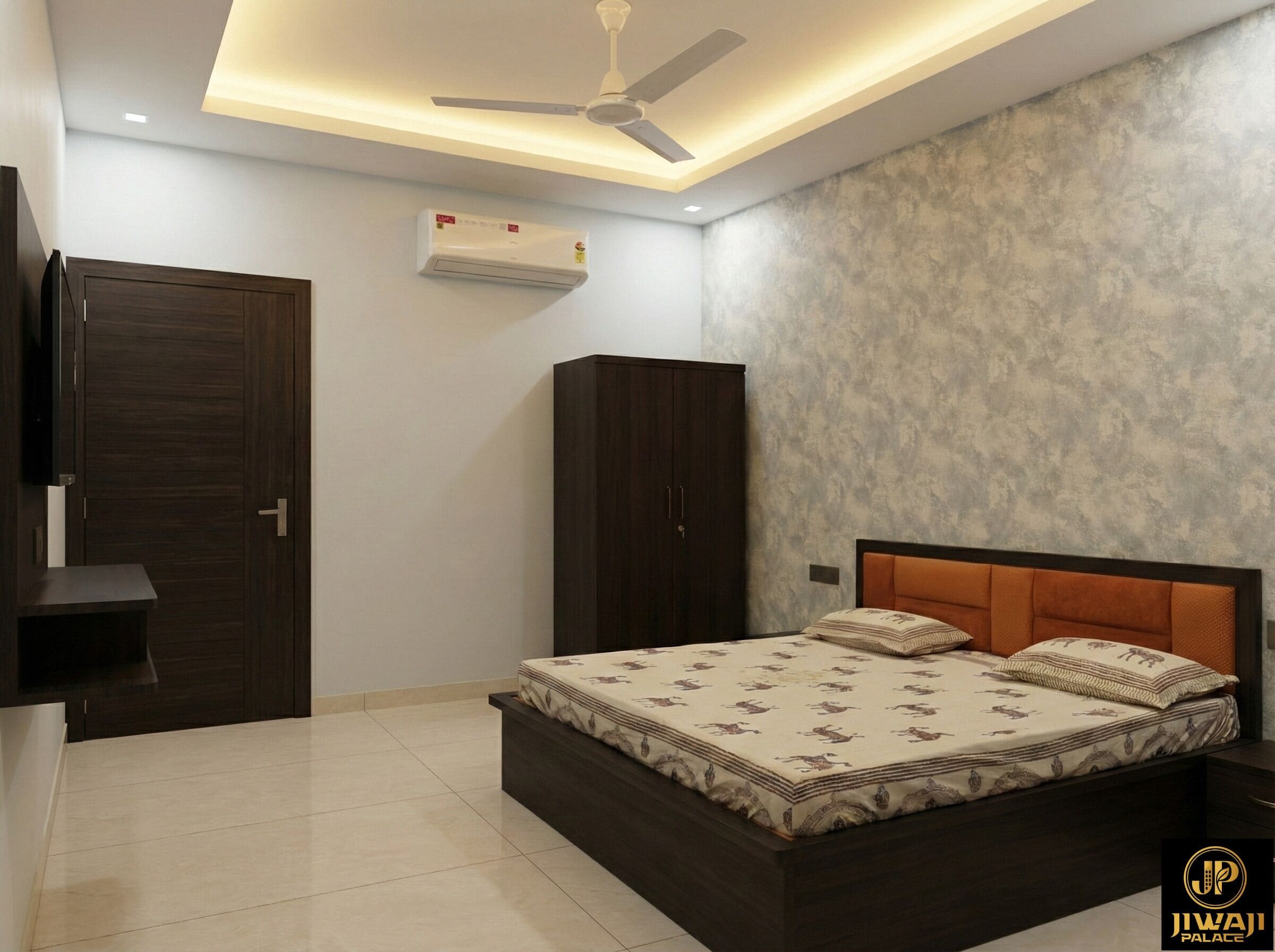 A bedroom with a bed, wardrobe, and ceiling fan.