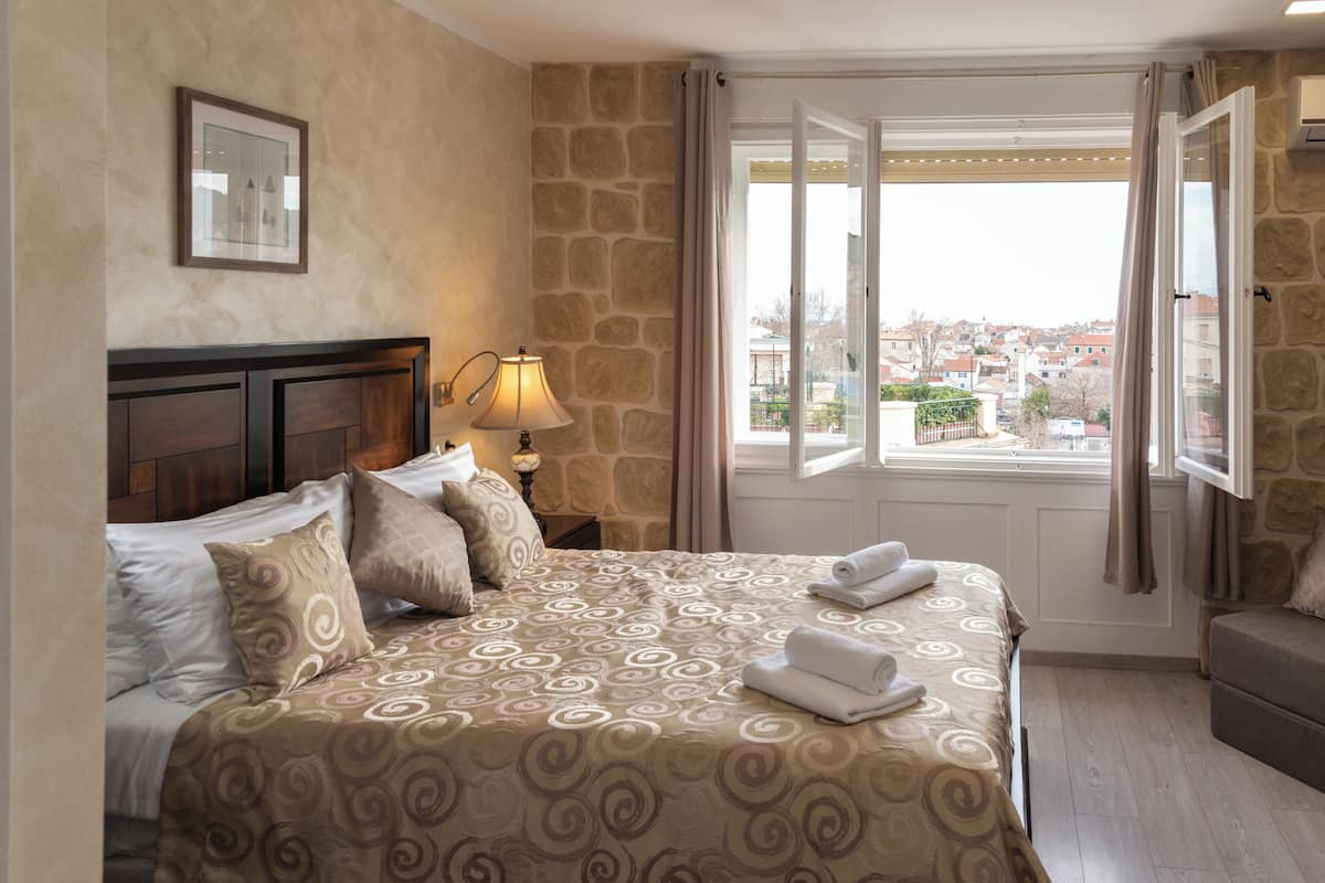 Deluxe Double Room, City View | In-room safe, iron/ironing board, free WiFi