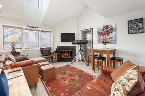 TV, fireplace, books, stereo - Mountain Condo | Ski-in Access | Hot-tub (Granby)