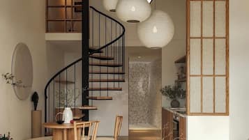 Departamento Prestigio, baño en la habitación | Área de sala de estar | Smart TV, chimenea, consola de videojuegos y Netflix