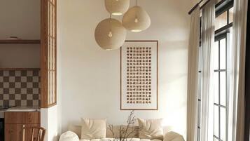 Signature Apartment, Ensuite | Living area | 45-inch Smart TV with digital channels, fireplace, video game console