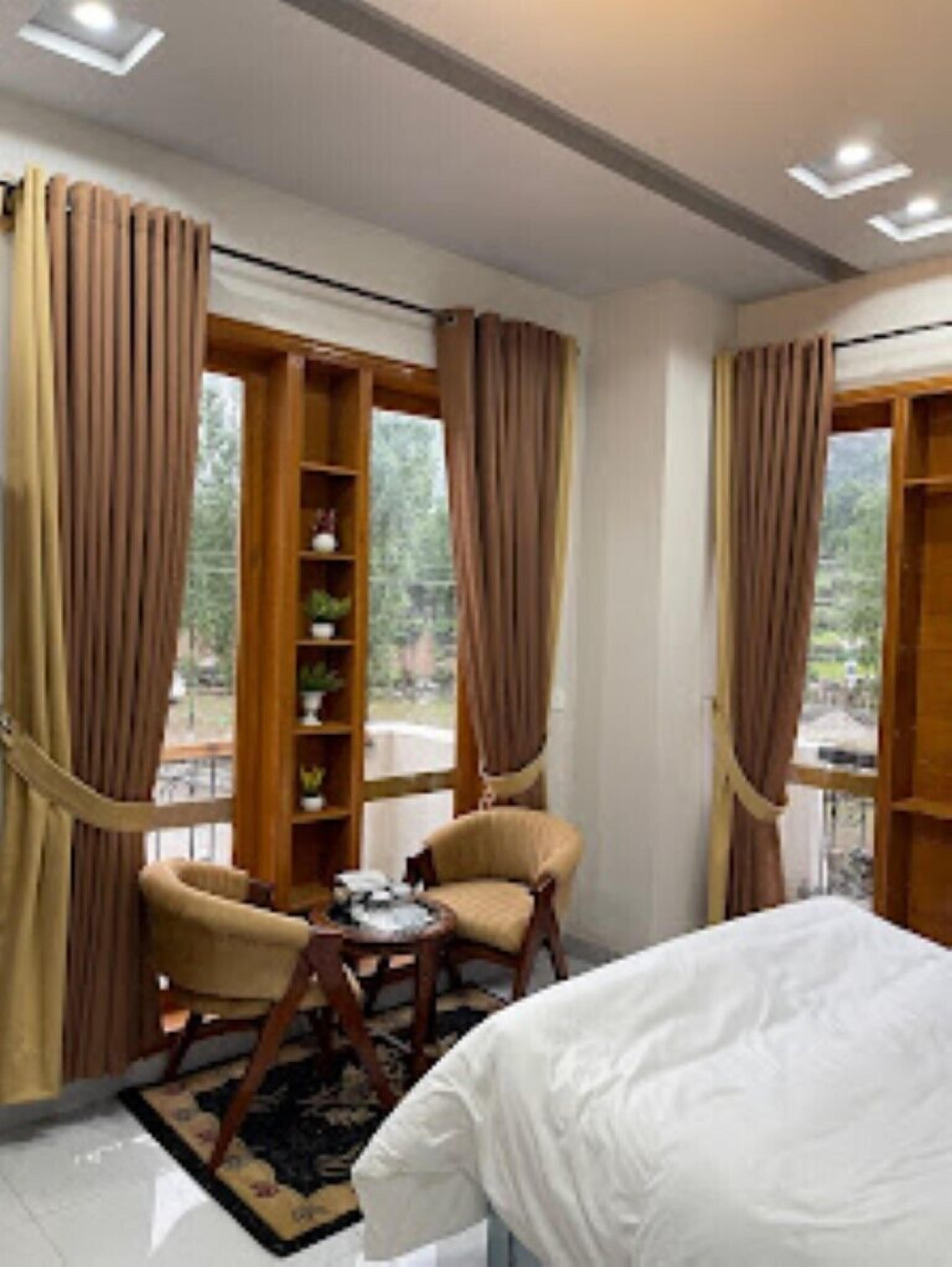 Habitación Deluxe doble, vistas a la montaña | Zona de estar