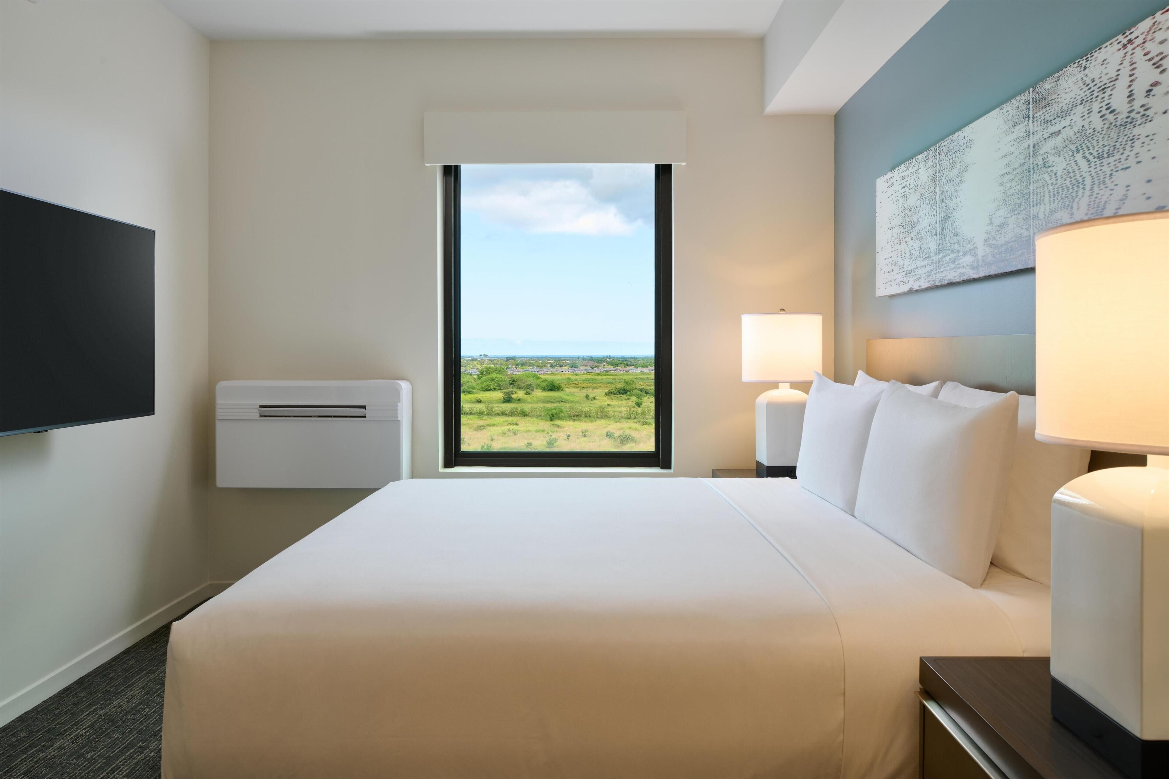 In-room safe, desk, blackout curtains, iron/ironing board