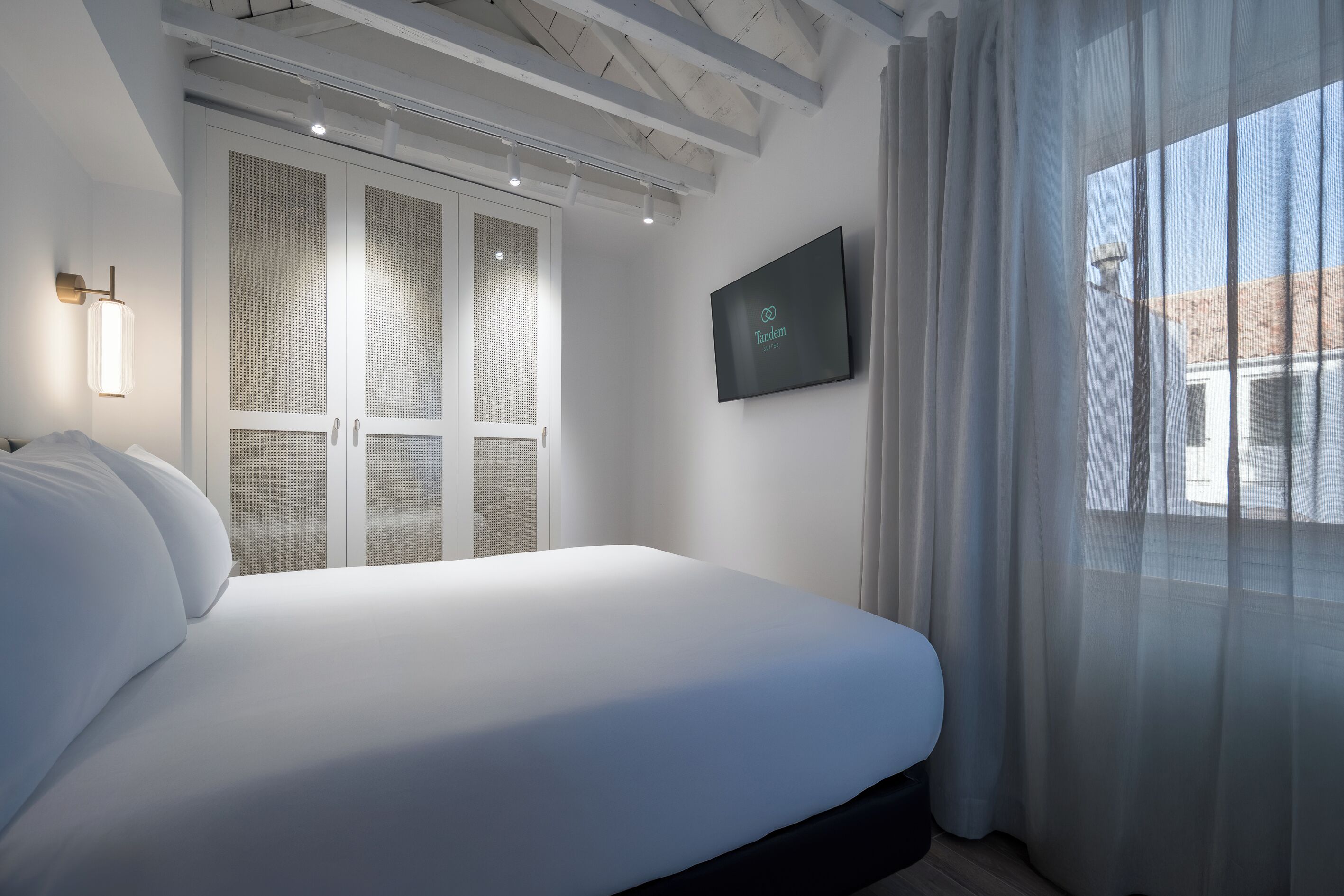 Down duvets, laptop workspace, blackout curtains, soundproofing
