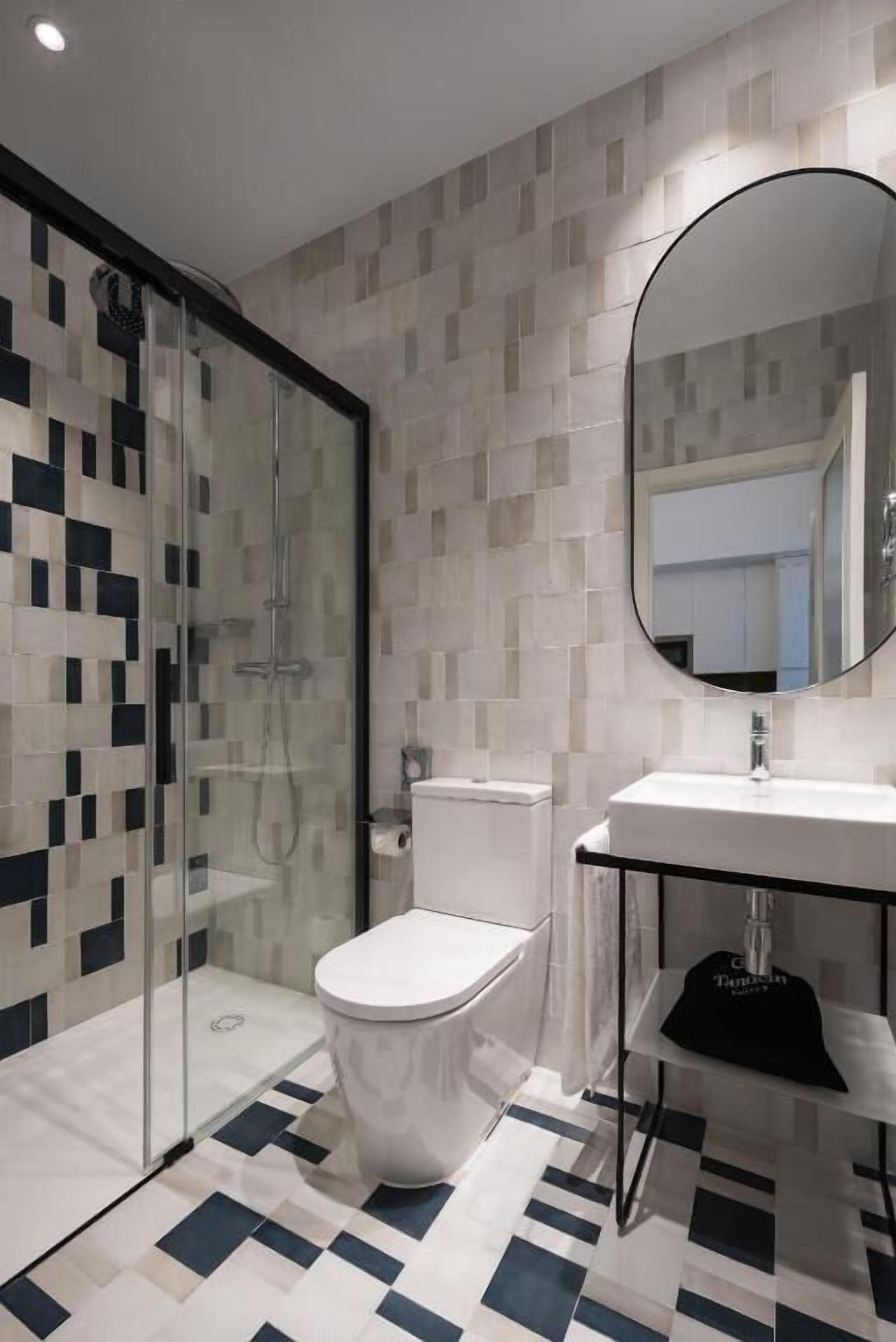 Shower, rainfall showerhead, designer toiletries, hair dryer