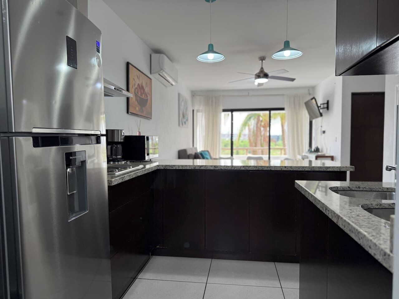 Fridge, microwave, stovetop, coffee/tea maker