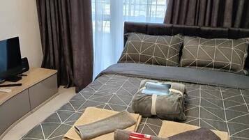 Blackout curtains, iron/ironing board, free WiFi