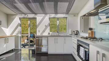 Fridge, microwave, dishwasher, coffee/tea maker