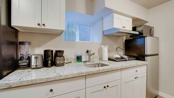 Fridge, microwave, coffee/tea maker, toaster