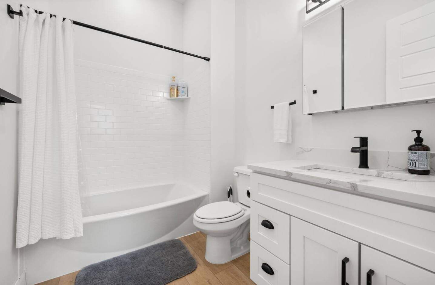 Bathroom with Tub and Modern Vanity