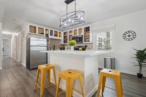 Fridge, microwave, oven, stovetop - Two Beach Homes with 2 Hot Tubs Sleeps 20+ (Michigan City)