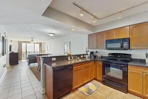 Fridge, microwave, oven, stovetop - 9th-floor oceanfront condo with pool, hot tub, private balcony & gym (North Myrtle Beach)