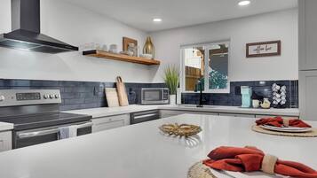 Fridge, stovetop, coffee/tea maker, cookware/dishes/utensils