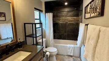 Hair dryer, towels, soap, toilet paper