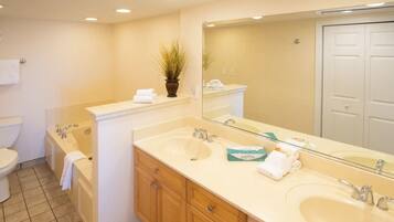 Shower, jetted tub, hair dryer, towels
