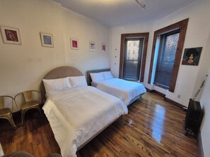 2 habitaciones, tabla de planchar con plancha, wifi y ropa de cama 
